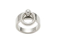 A silver-toned metal ring with a unique double interlocking circular design and a small polished ball on top, shown against a plain white background.