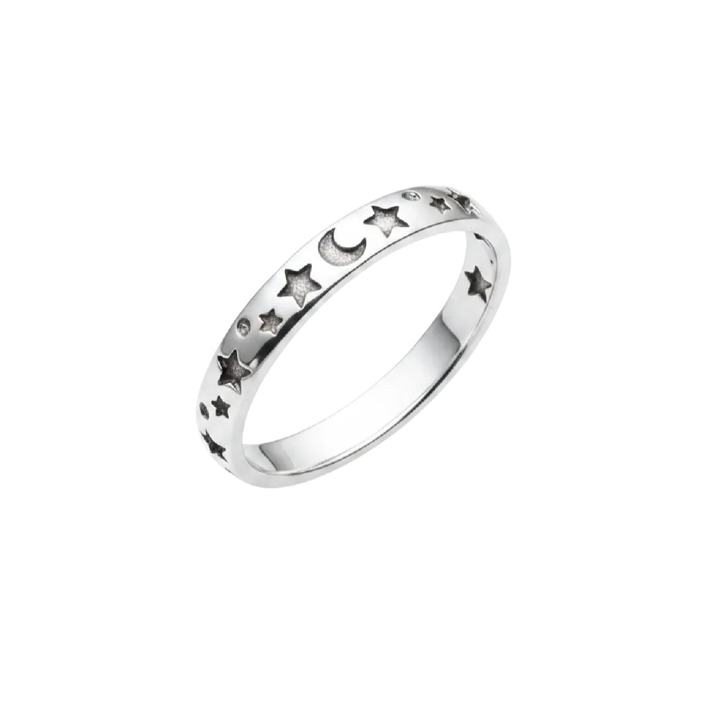 A silver band ring featuring a repeating pattern of cutout stars and a crescent moon, shown on a plain white background.