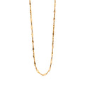 Gold chain necklace on a white background