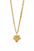 A gold chain necklace with a textured, leaf-shaped pendant, shown against a plain white background.