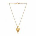 Gold necklace with a heart-shaped pendant on a white background