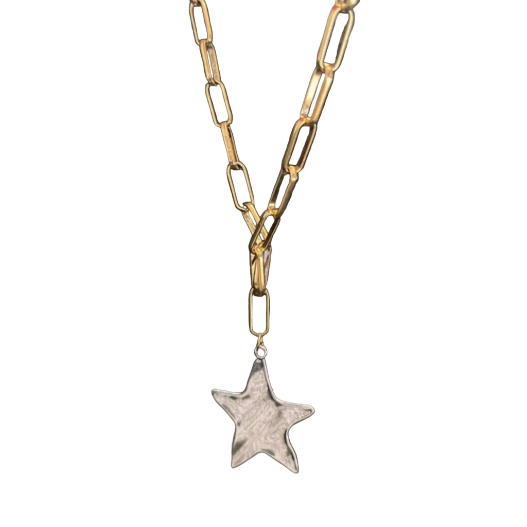 Gold chain necklace with a star pendant on a white background