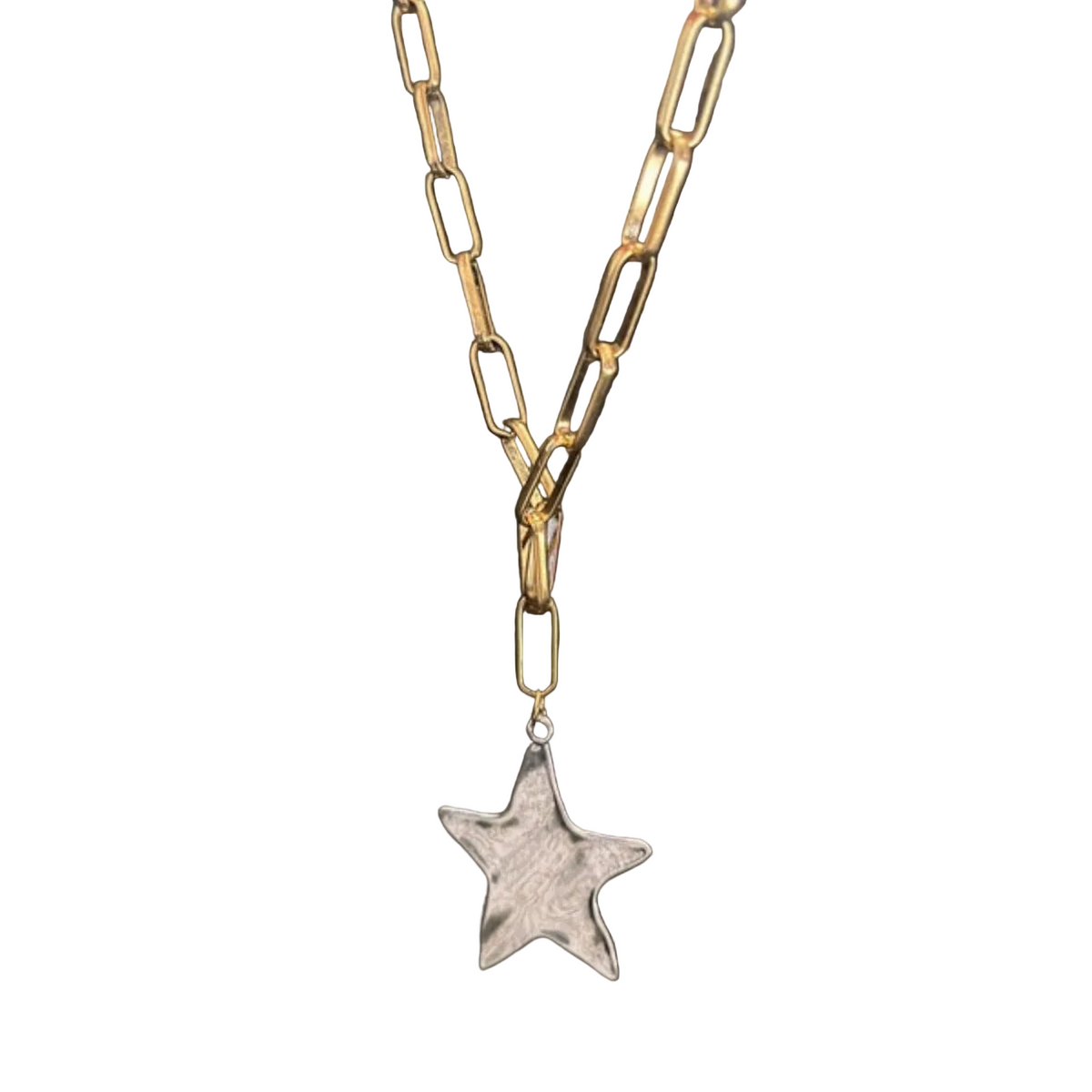 Gold chain necklace with a star pendant on a white background