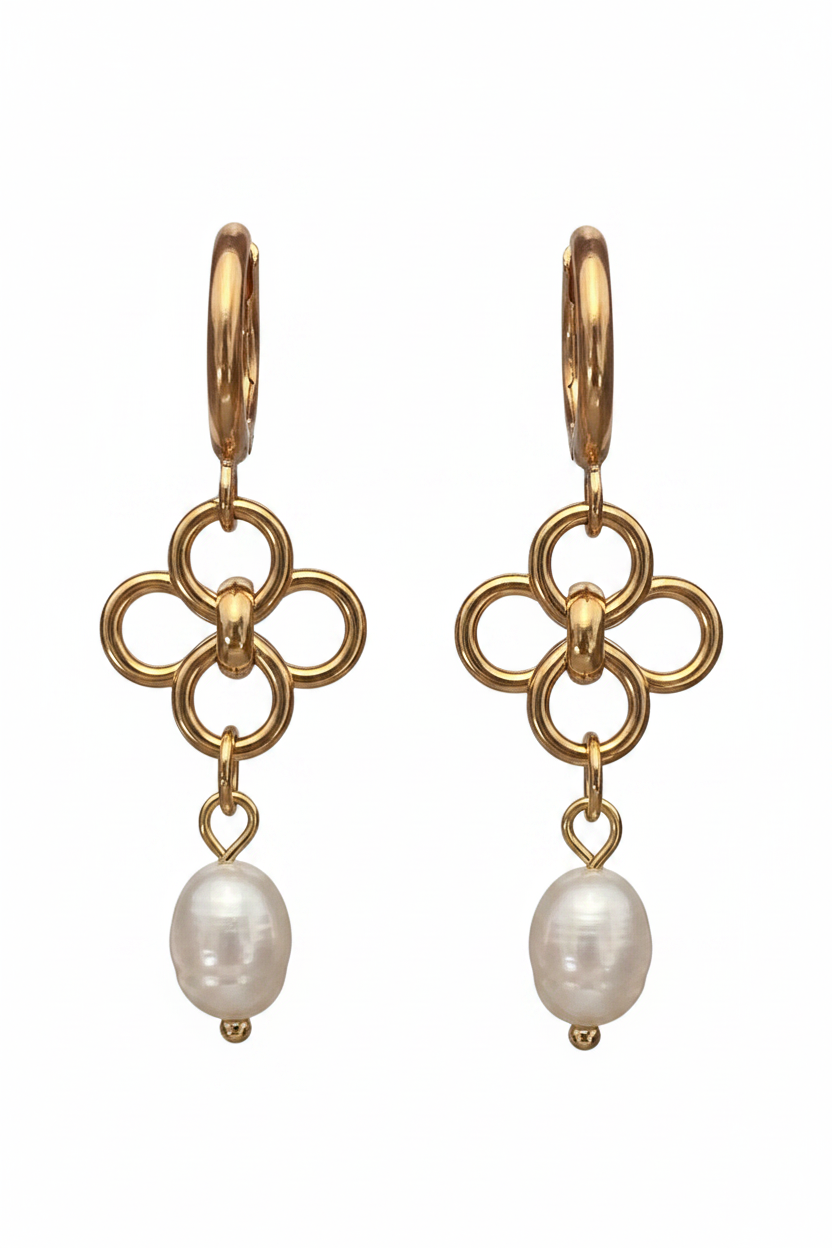 A pair of gold hoop earrings with a four-ring floral design and a dangling white pearl, shown on a plain white background.
