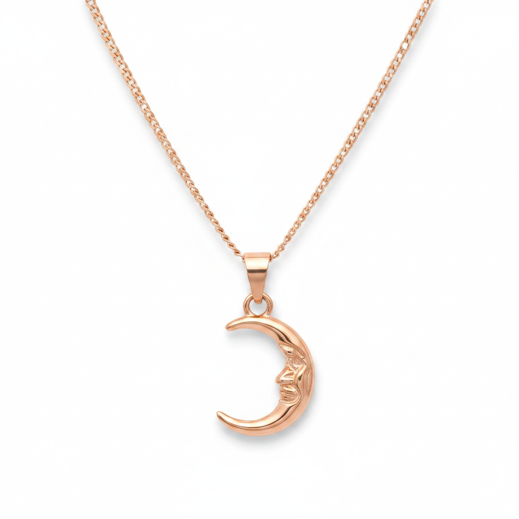 Gold moon-shaped pendant necklace on a white background