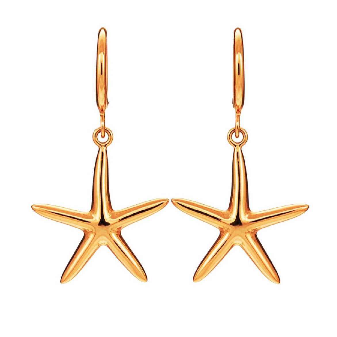 Gold starfish earrings on a white background