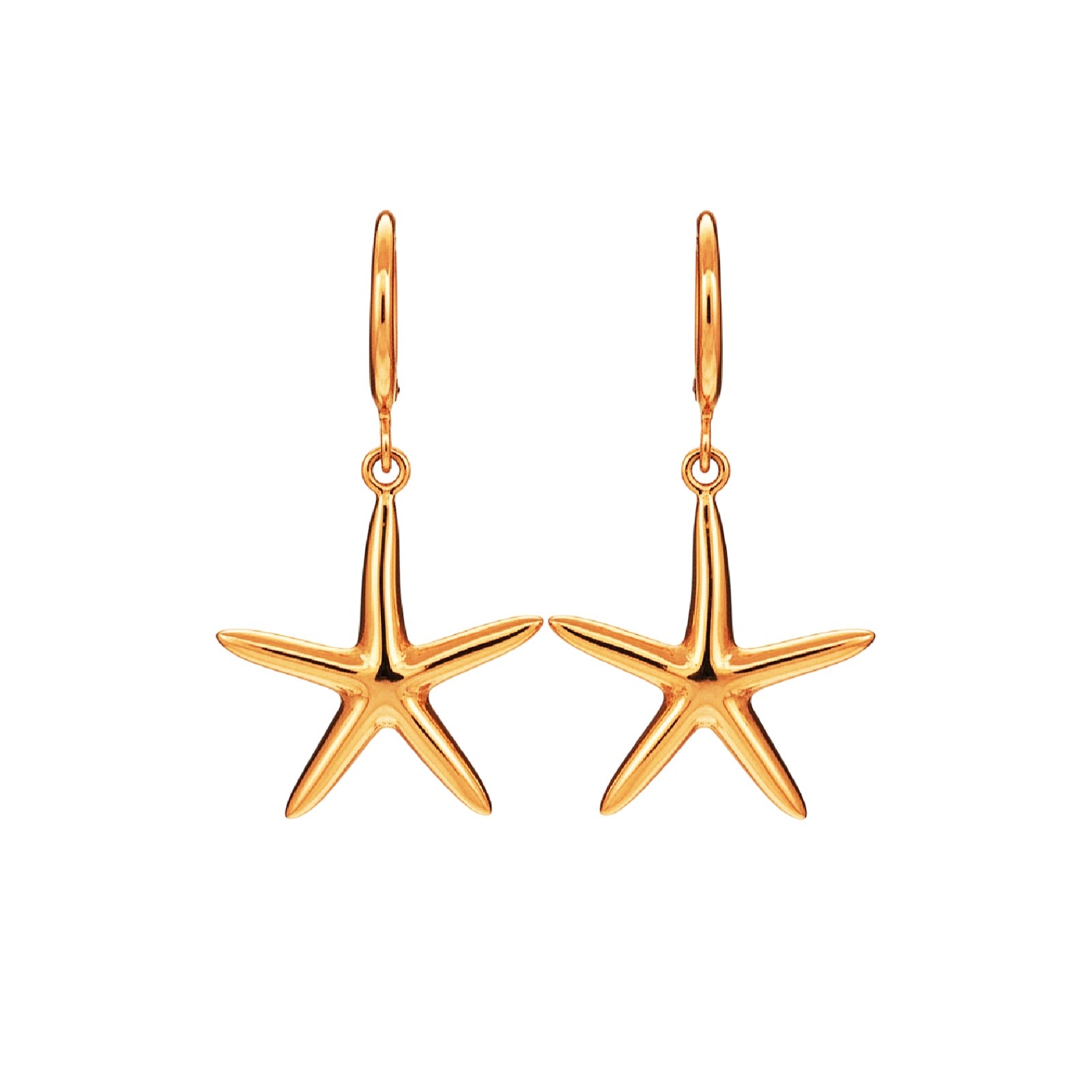 Gold starfish earrings on a white background
