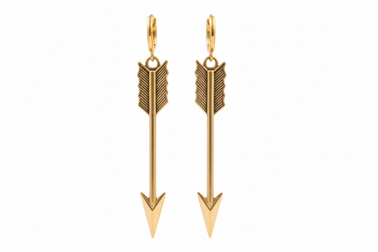 Gold arrow-shaped earrings on a white background