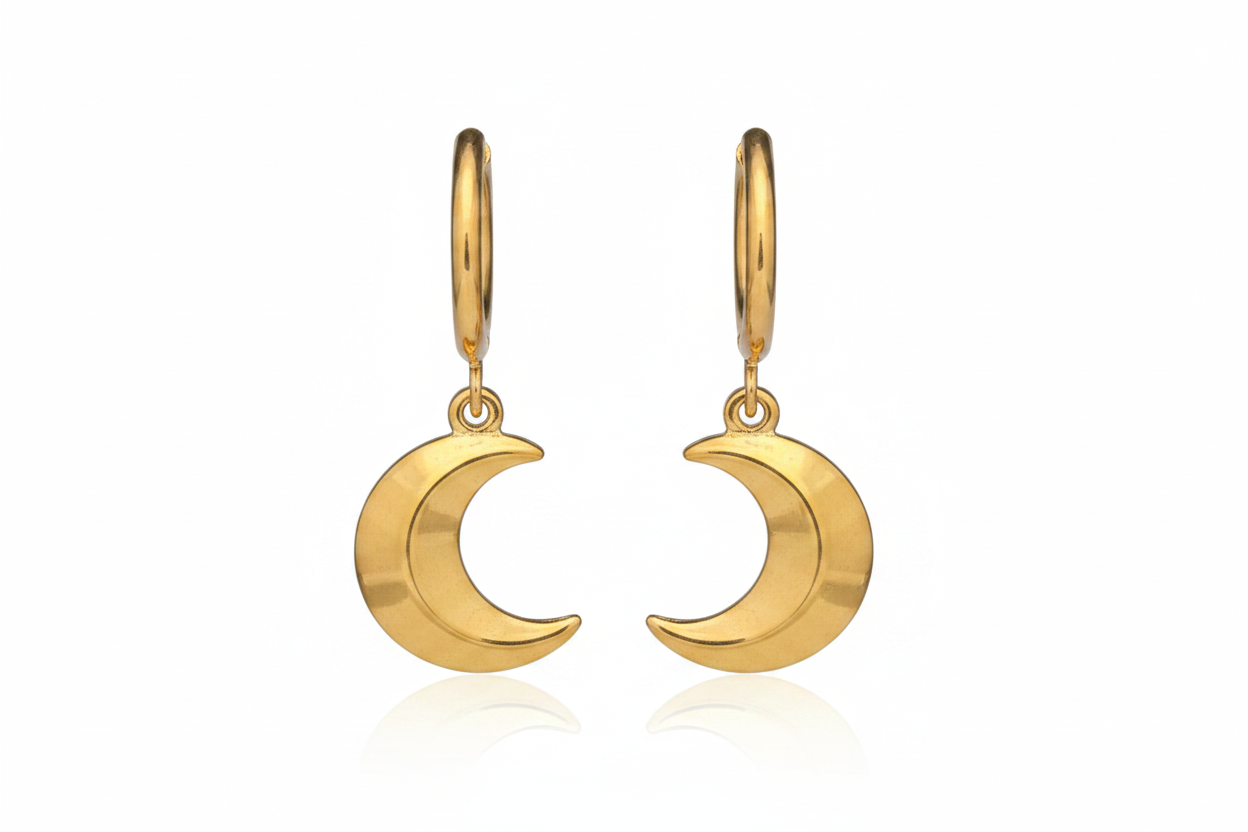 Gold crescent moon earrings on a white background