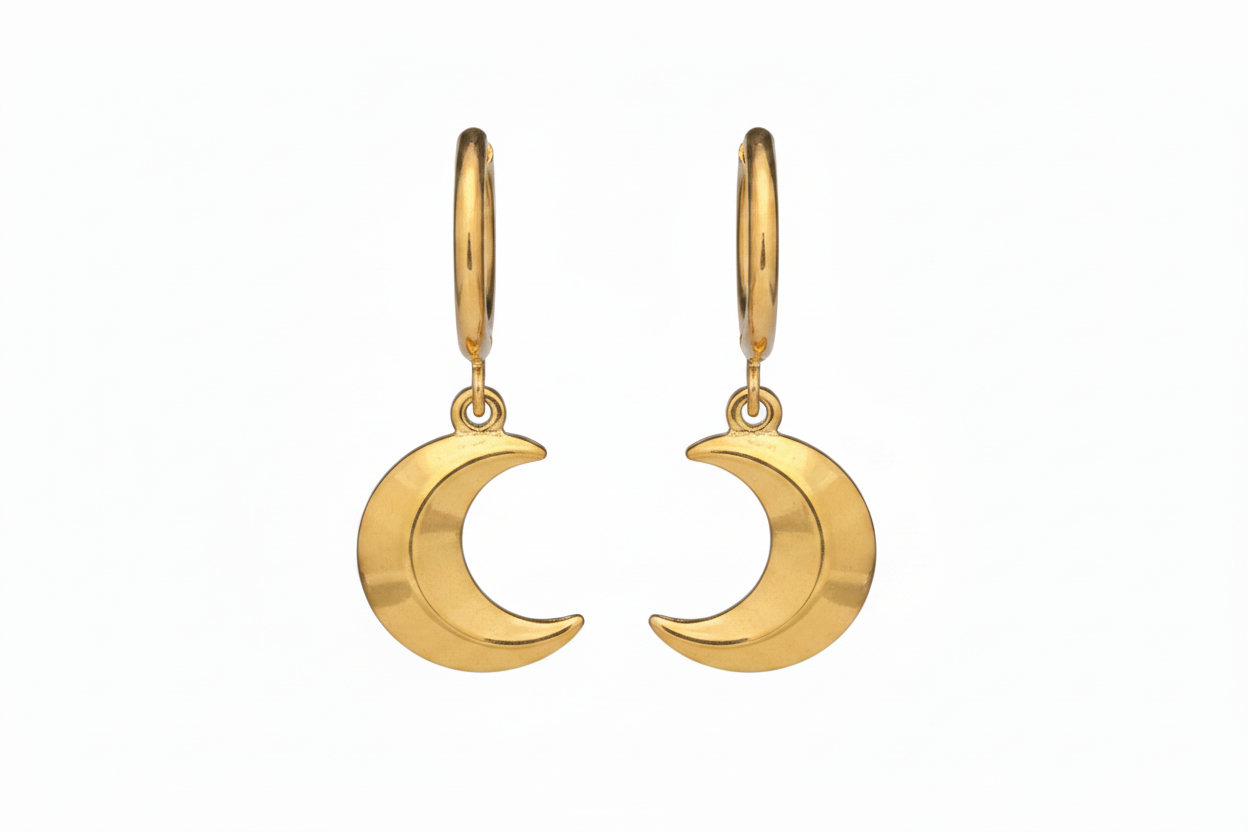 Gold crescent moon earrings on a white background