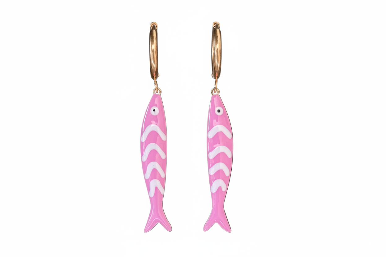 Pink fish-shaped earrings with gold hoops on a white background