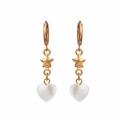 Gold earrings with star and heart charms on a white background
