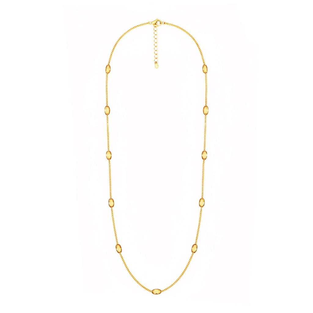 Gold necklace on a white background