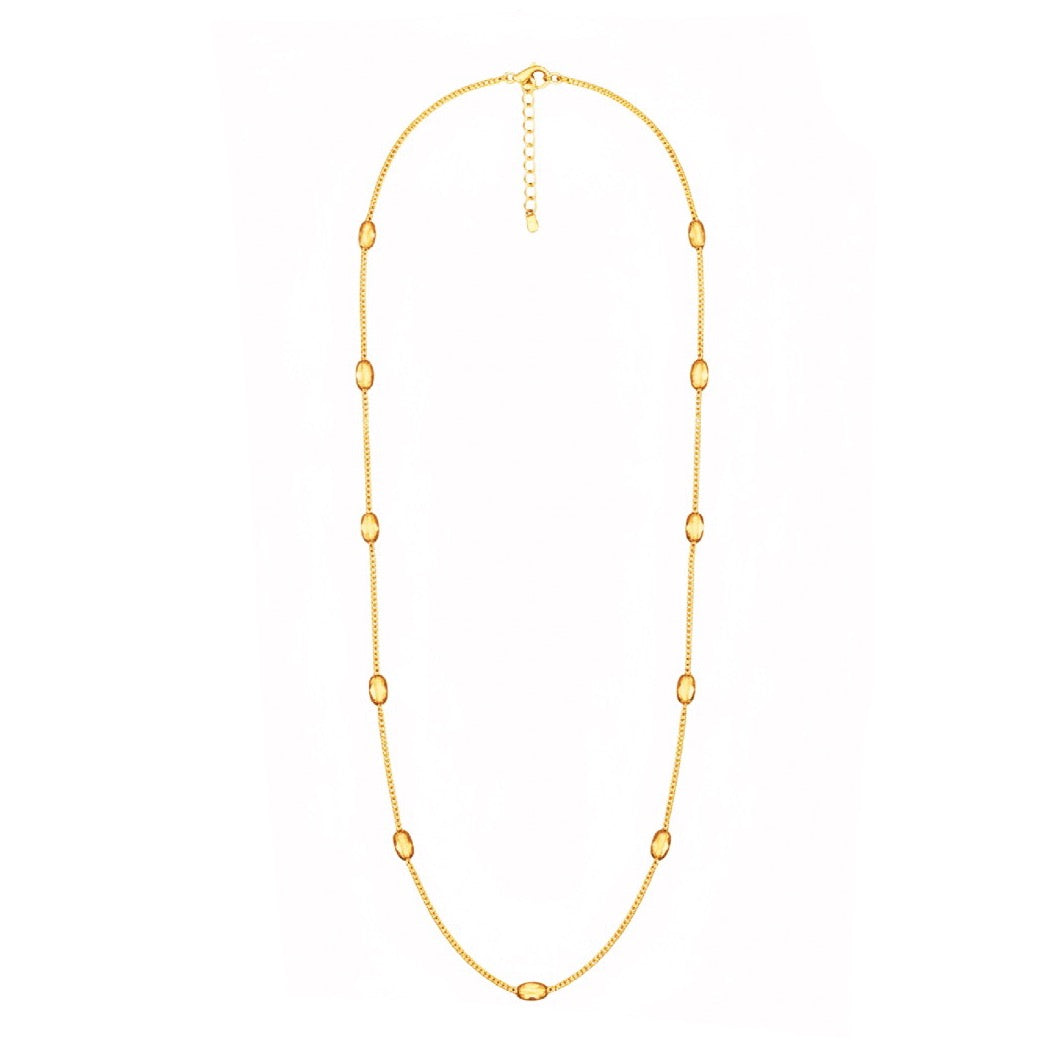 Gold necklace on a white background