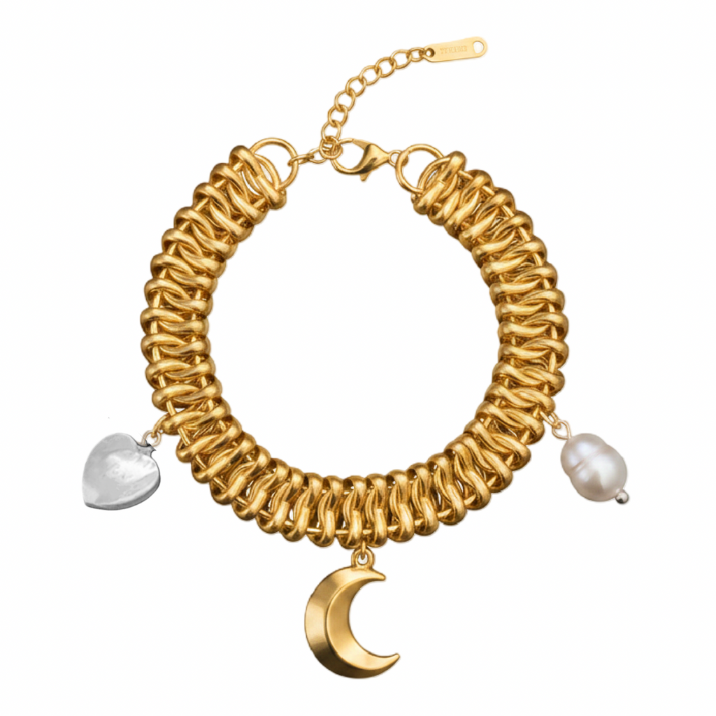 Gold bracelet with moon and heart charms on a white background