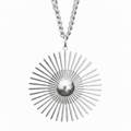 A silver sunburst pendant necklace with a central polished sphere and radiating spikes, suspended from a silver curb chain against a plain white background.