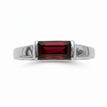 A silver ring with a rectangular red gemstone, against a white background.