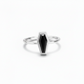 A silver coffin-shaped ring with a black inlay, centered on a clean white background.