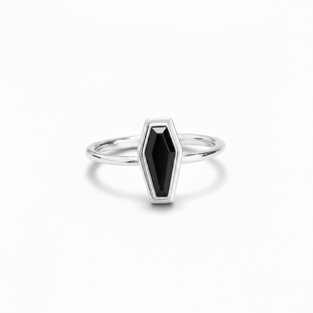 A silver coffin-shaped ring with a black inlay, centered on a clean white background.
