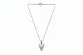 Silver heart-shaped pendant on a chain against a white background