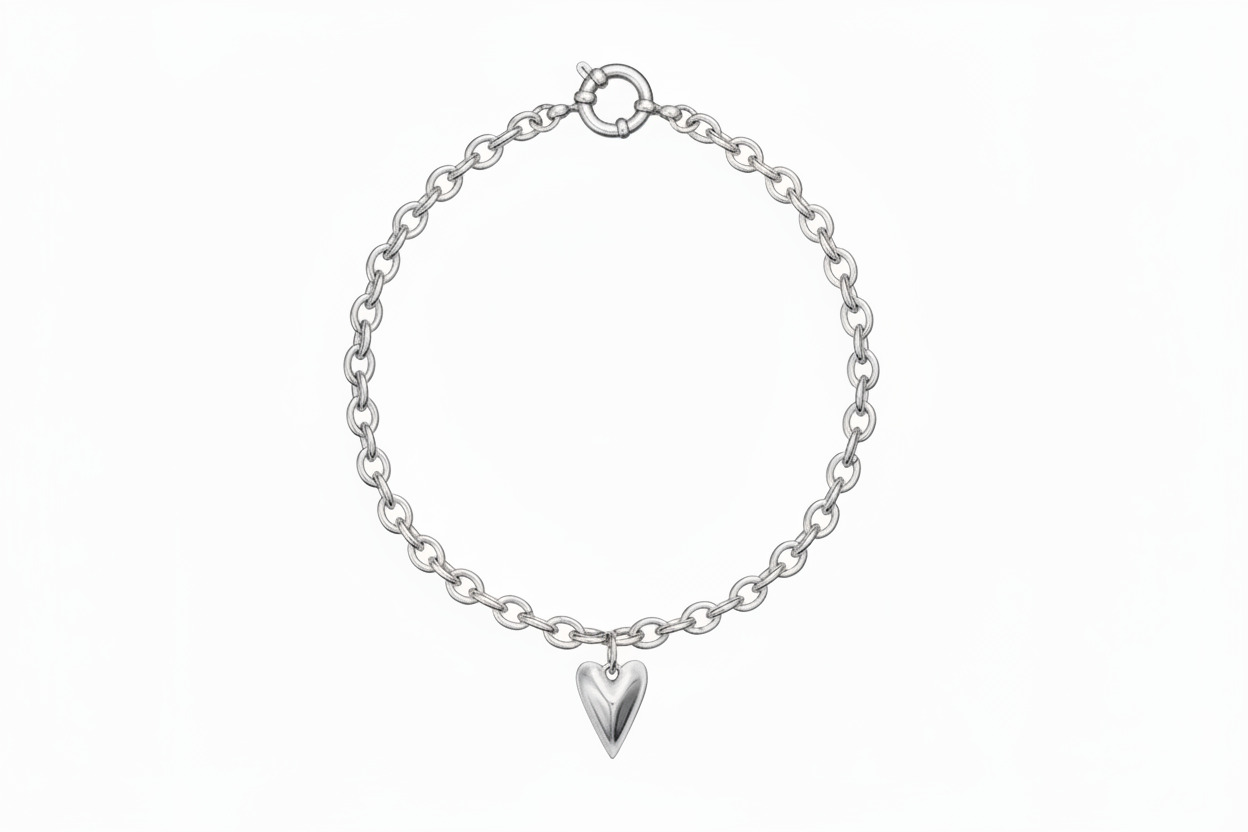 Silver chain bracelet with a heart-shaped charm on a white background