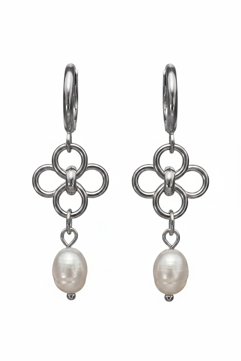 A pair of silver-toned hoop earrings with a four-ring floral motif and a dangling baroque pearl, shown on a plain white background.
