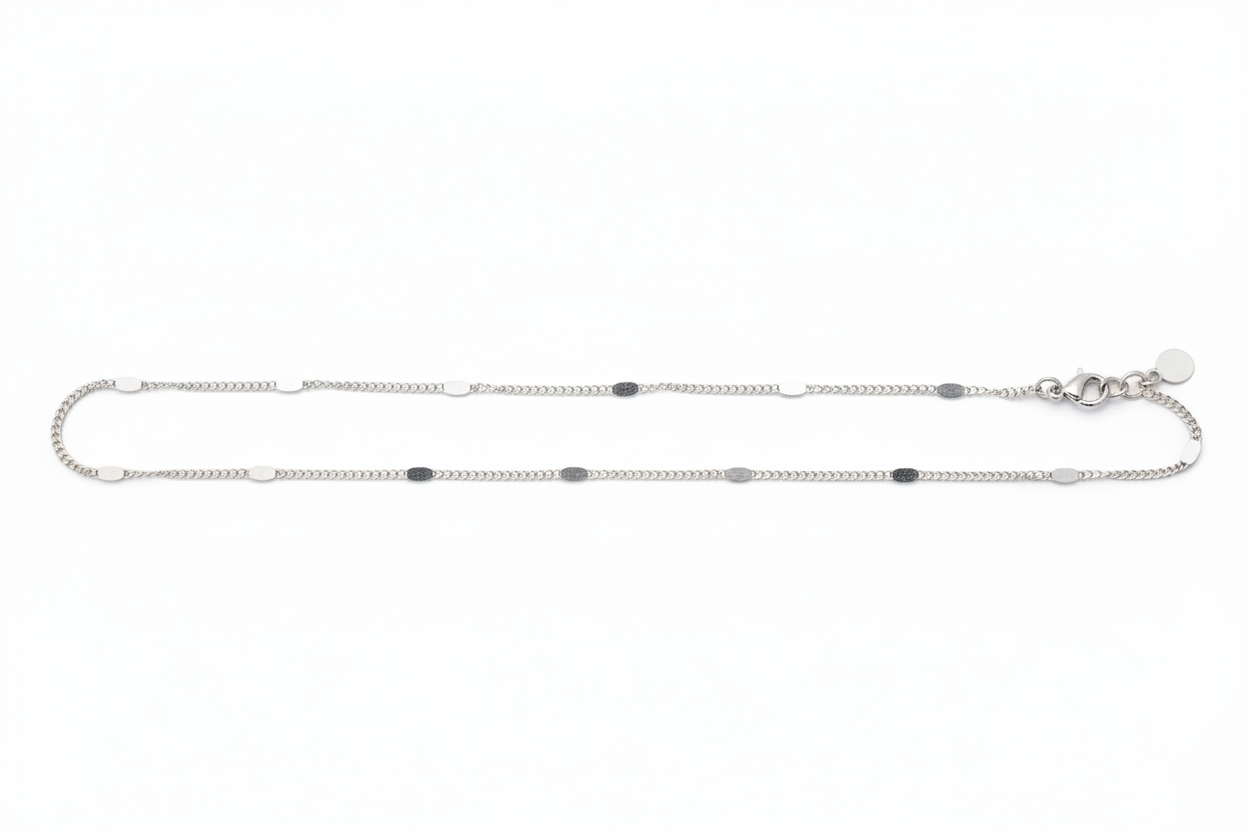 Silver chain necklace on a white background