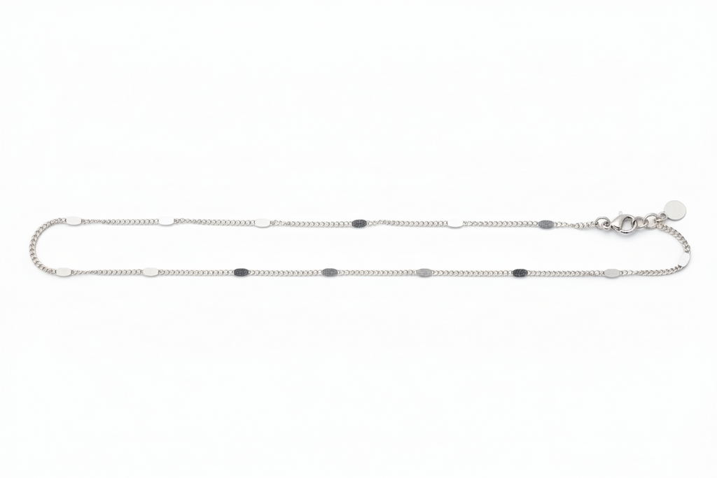 Silver chain necklace on a white background