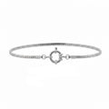 Silver bracelet with a clasp on a white background