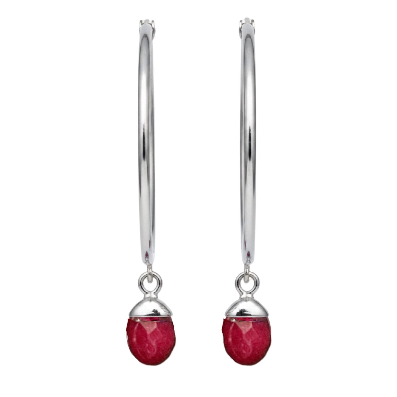 Silver earrings with red gemstones on a white background