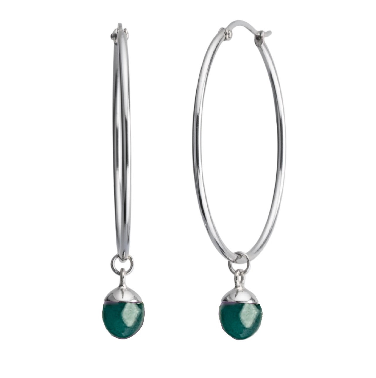 Silver hoop earrings with turquoise  on a white background crystals
