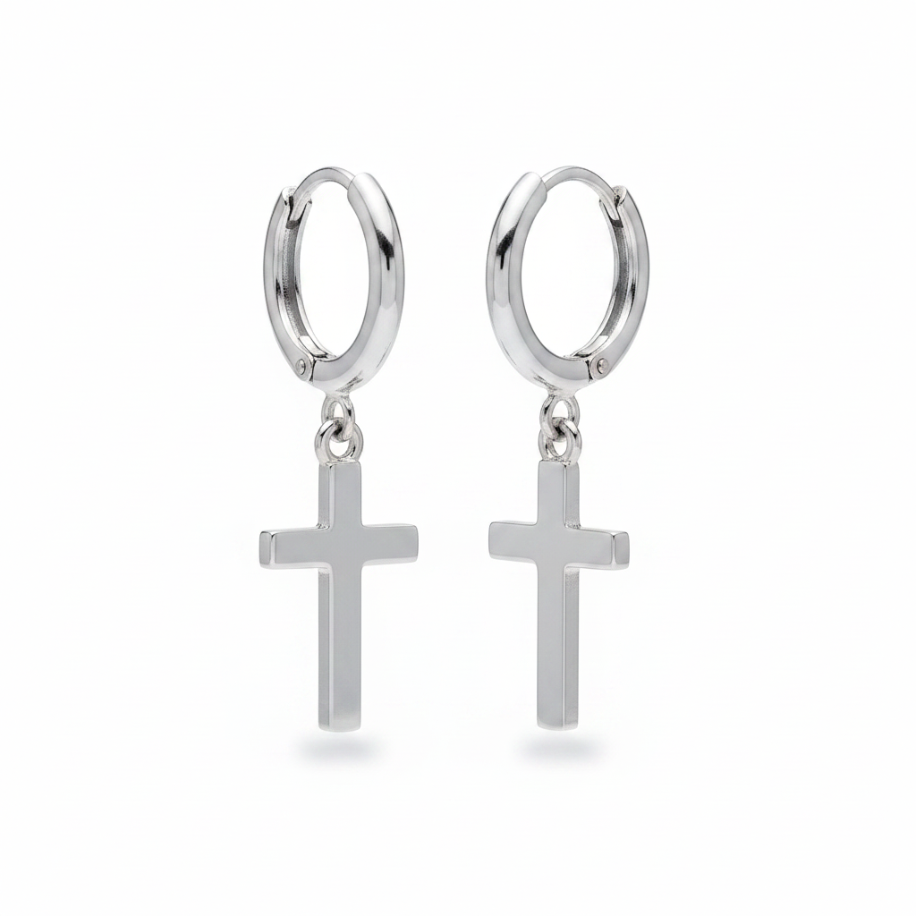 A pair of polished silver hoop earrings with dangling cross charms, shown against a plain white background.