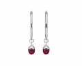 Pair of silver hoops with a pink oval-shaped crystal on a white background