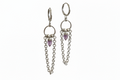 Silver hoop earrings with chainmail detail and an amethyst crystal on a white background.