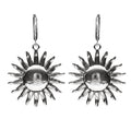 Silver sun-shaped earrings on a white background