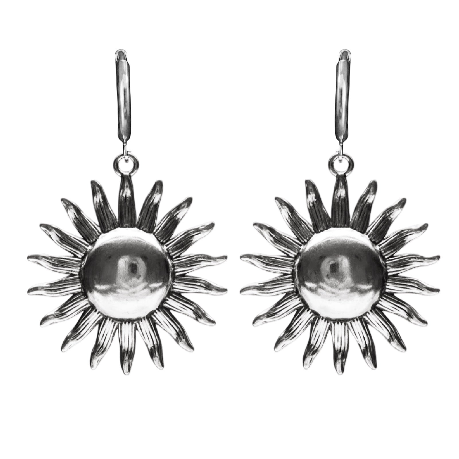 Silver sun-shaped earrings on a white background
