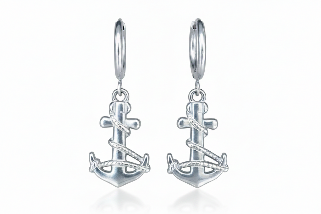Silver anchor-shaped earrings on a white background