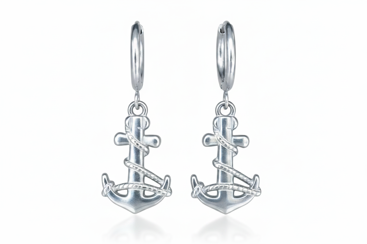 Silver anchor-shaped earrings on a white background