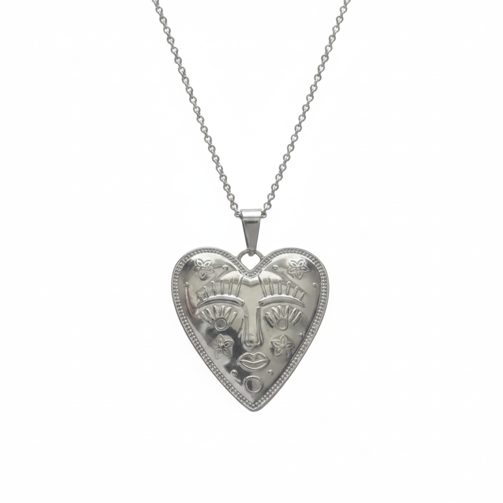 Silver heart-shaped pendant necklace on a white background