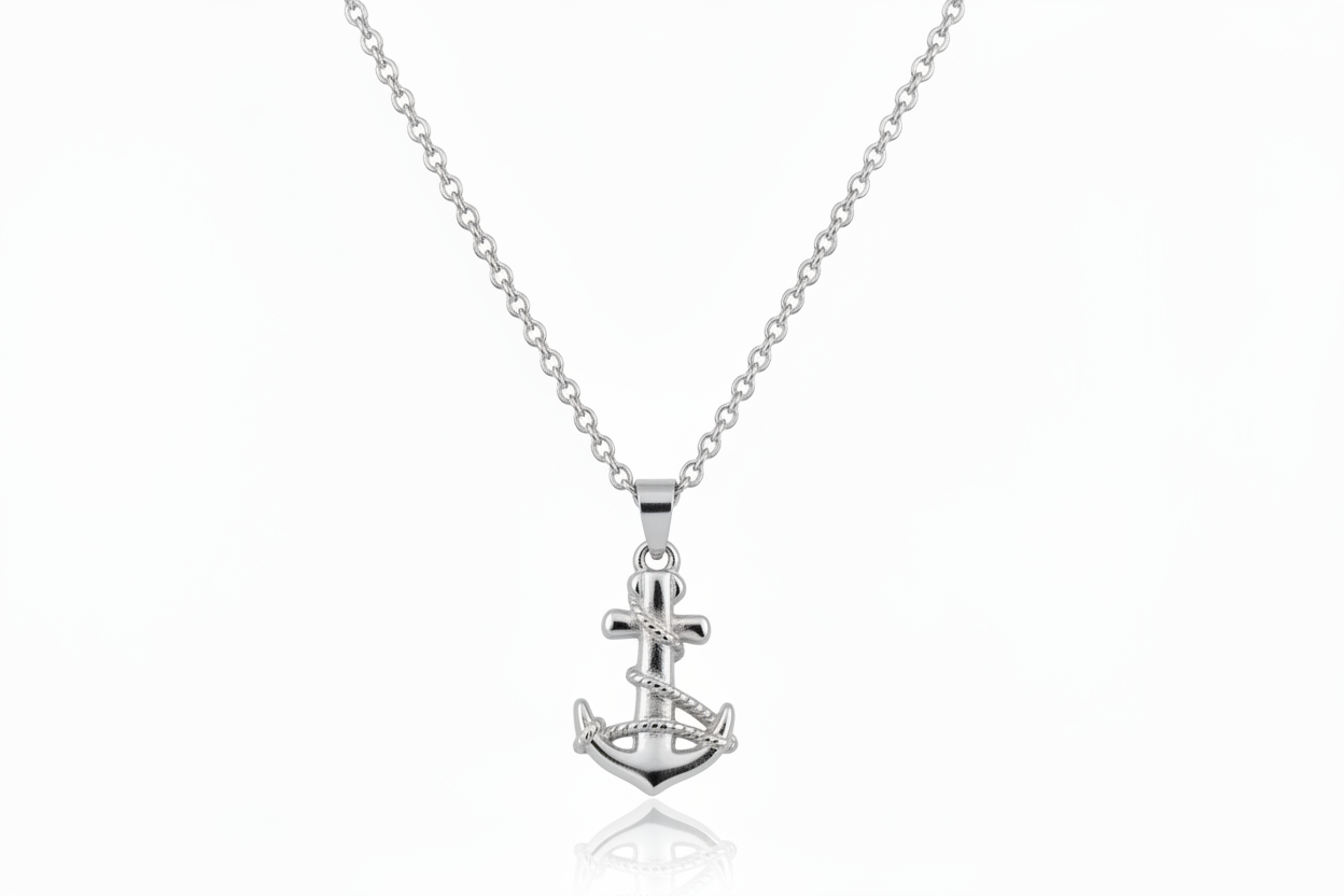 Silver anchor pendant necklace on a white background