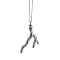 Silver coral-shaped pendant on a chain against a white background