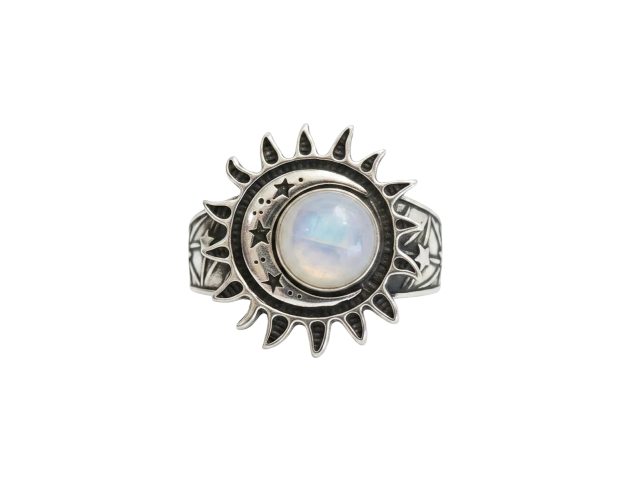 A silver sun and moon ring featuring a central round moonstone with a soft blue and white iridescent sheen, set against a plain white background.