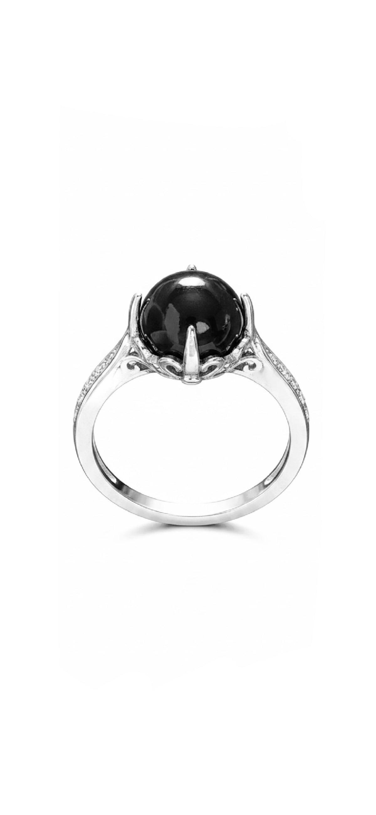 A silver-toned ring featuring a large, polished black oval gemstone in a prong setting, with small clear stones along the shoulders, shown on a plain white background.