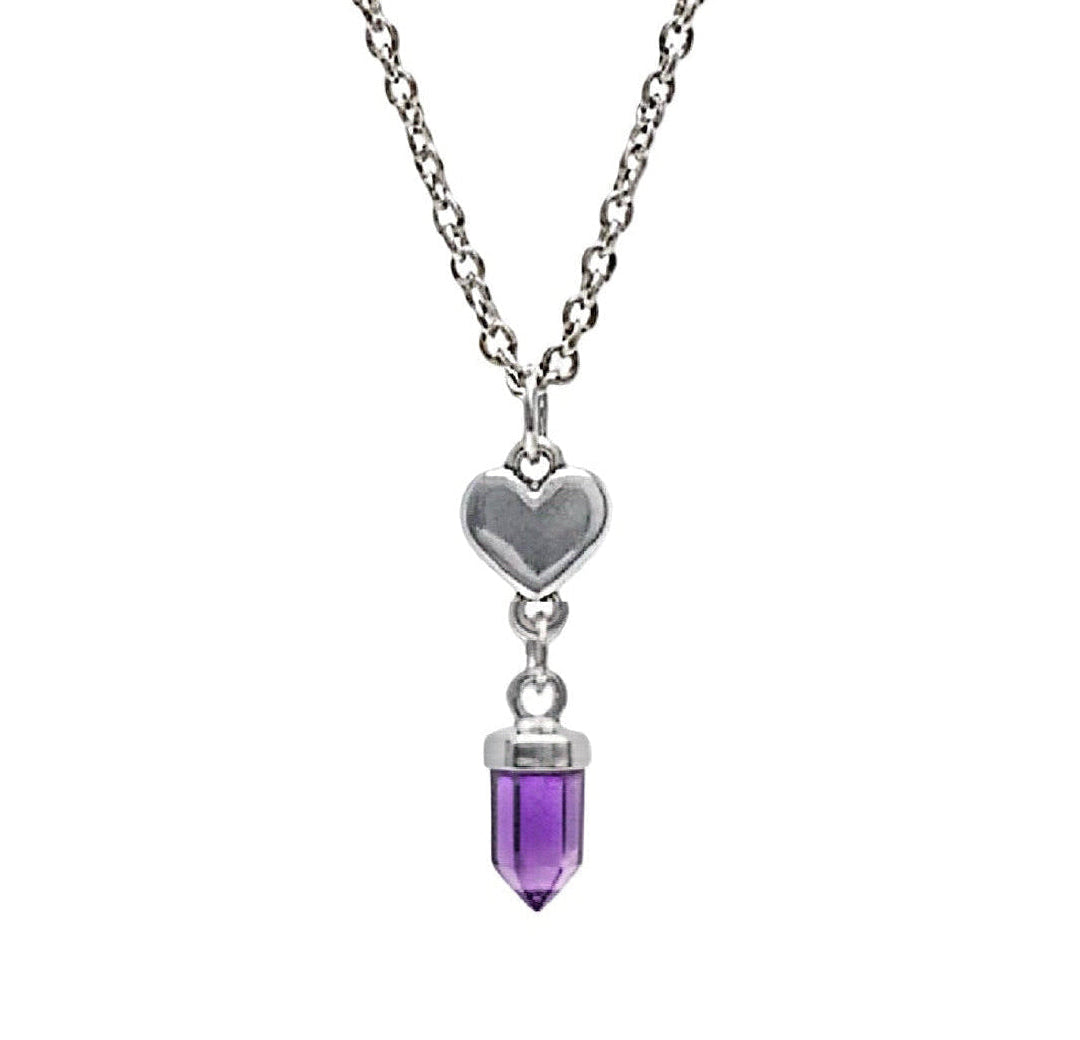 A silver chain with a silver heart and an Amethyst crystal pendant against a white background. 