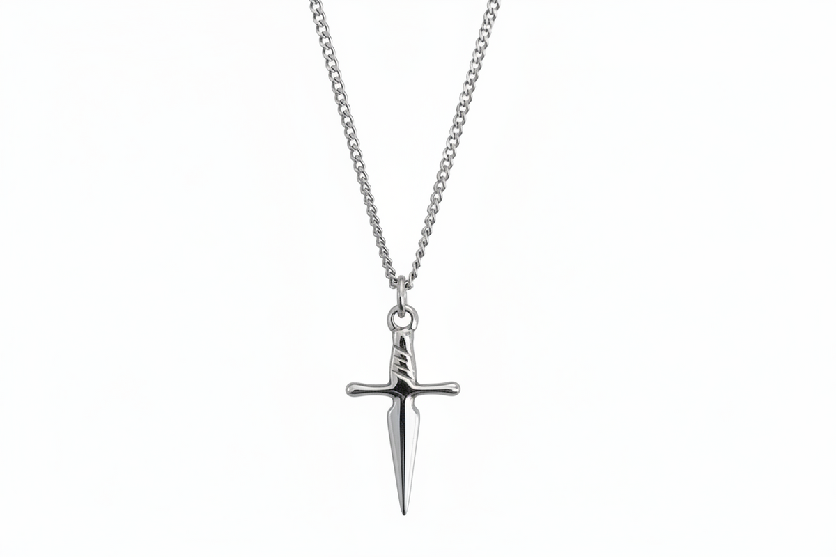 Silver sword-shaped pendant on a chain against a white background