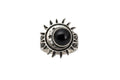 A silver ring featuring a central black round stone surrounded by a sunburst and crescent moon design, set against a plain white background.