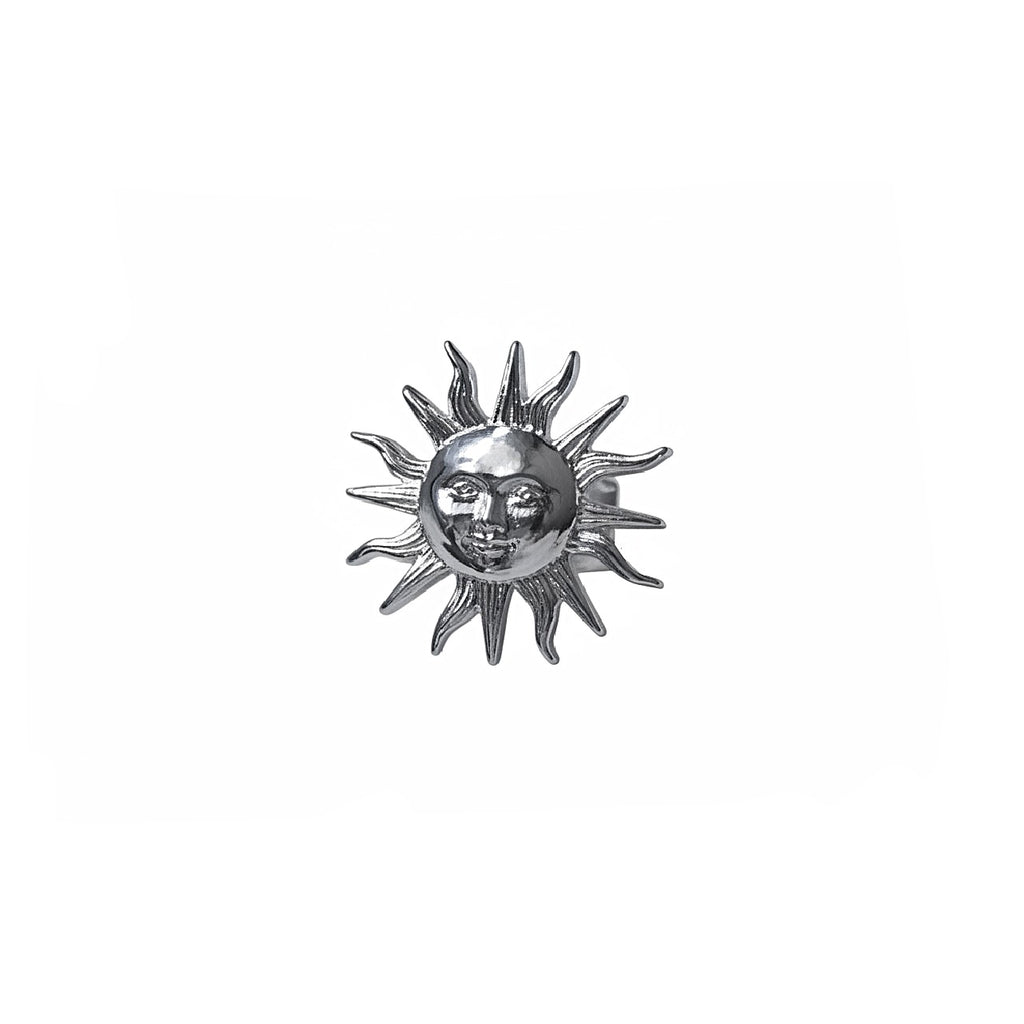 Silver sun design ring on a white background