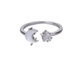 Silver ring with a crescent moon and a zircon star against a white background. 